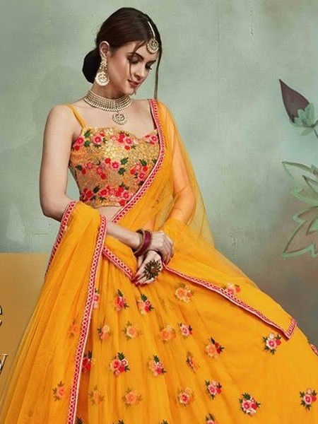 Mustard yellow floral net lehenga