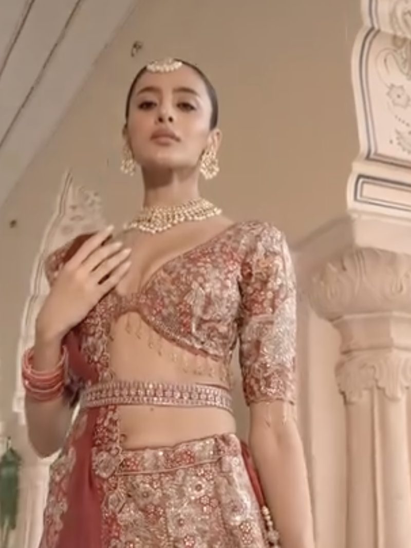 Gold and maroon embellished reception lehenga